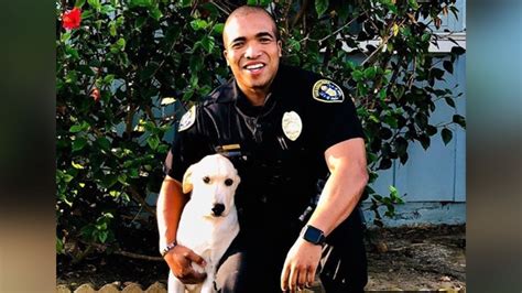 Officer adopts dog he found abandoned in a stolen vehicle